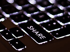 computer keyboard with a "SHARE" key
