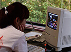 person-using-apple-macintosh-color-classic-ii