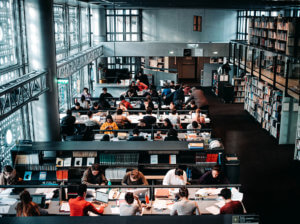 photo of students using a university library