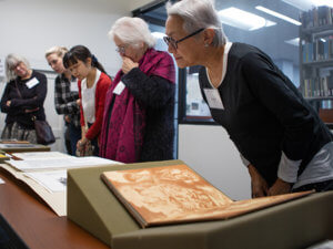 photo of people using UCI Libraries' Orange County and Southeast Asian Archive Center