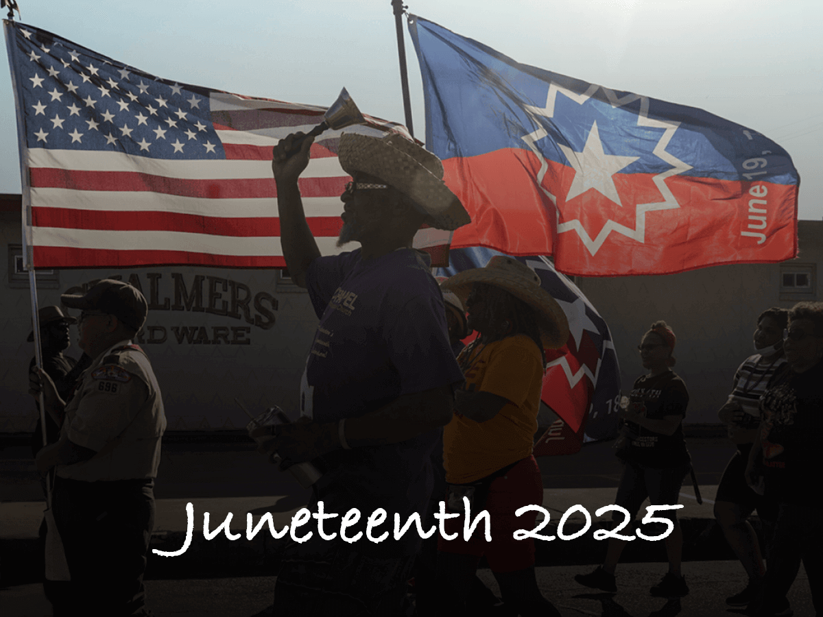 Exercising civic engagement, parade demonstrators proudly display the US American flag flanked by the Juneteenth Commemorative flag. 