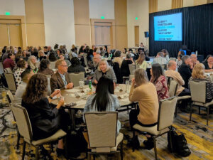 photo of a plenary meeting session in a ballroom