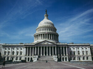 photo of the US Capitol building on a sunny day